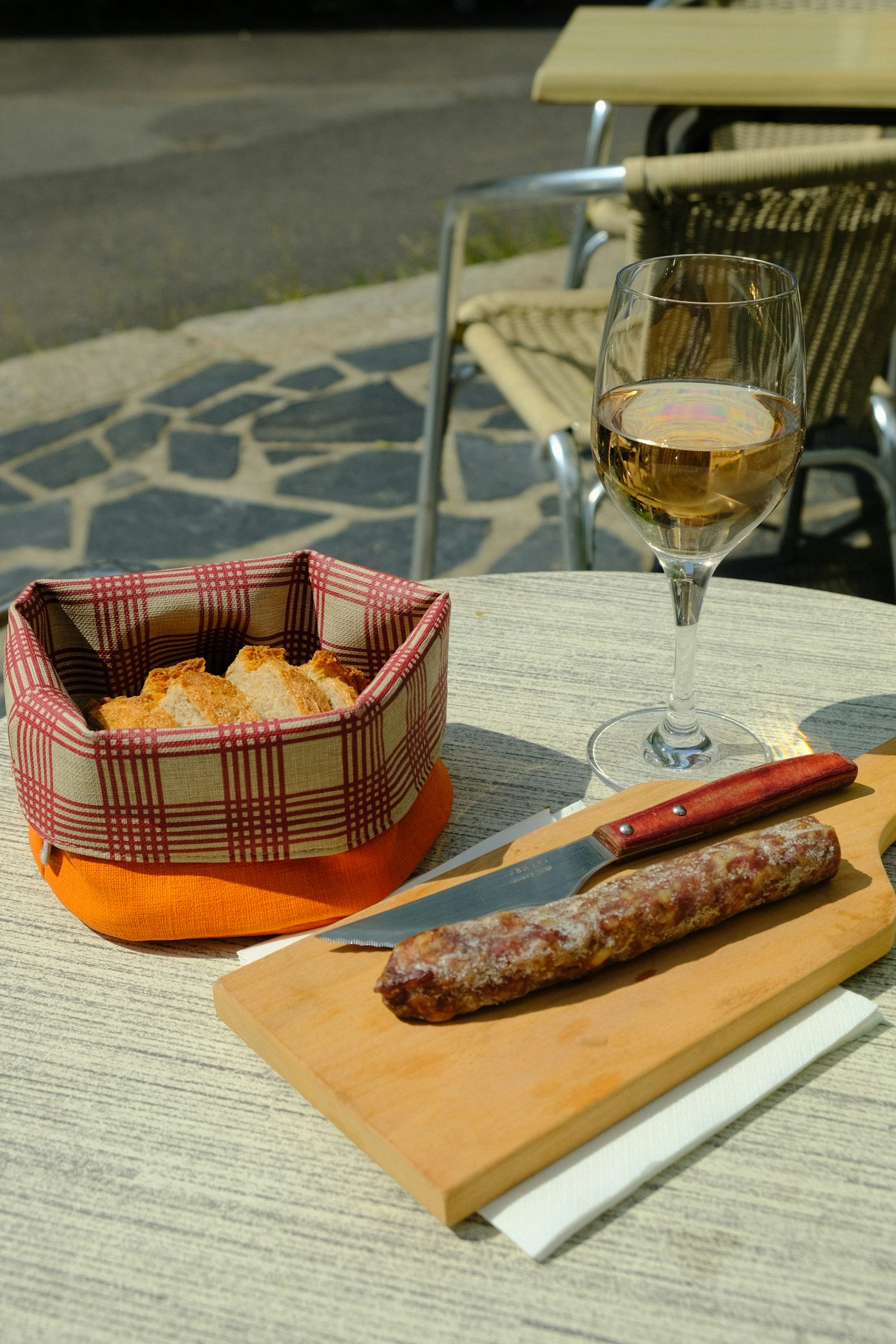 Grilled meat, local wine, and fries at a Canarian guachinche
